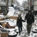 Huyendo de los desastres sísmicos en Japón.