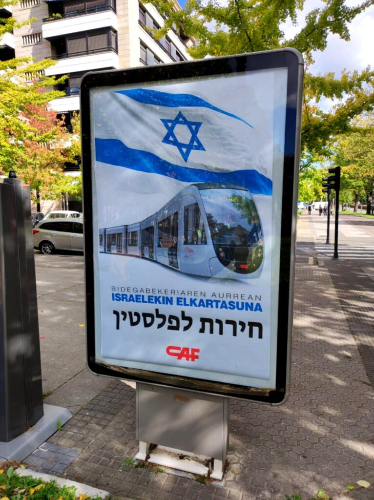 Campaña anti-publicitaria en marquesinas de Donostia contra la alianza entre la empresa vasca CAF y el Estado de Israel.