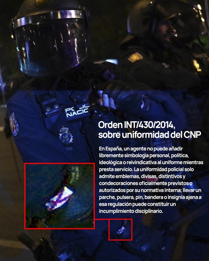 Policía que exhibía en su uniforme la ultraderechista cruz de Borgoña.